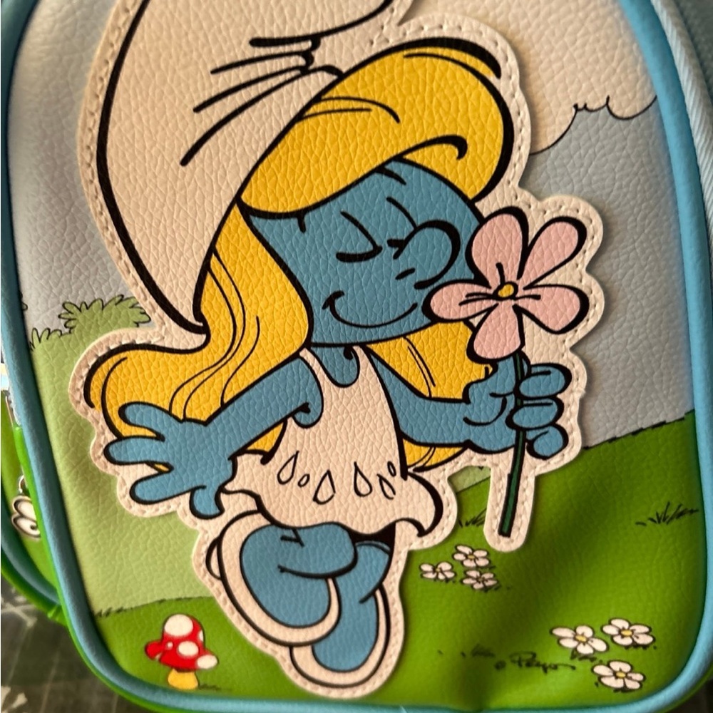 Smurf’s White and Blue Backpack super cute